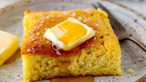 Marie Callender's Cornbread Slice on a Plate with Butter and Honey