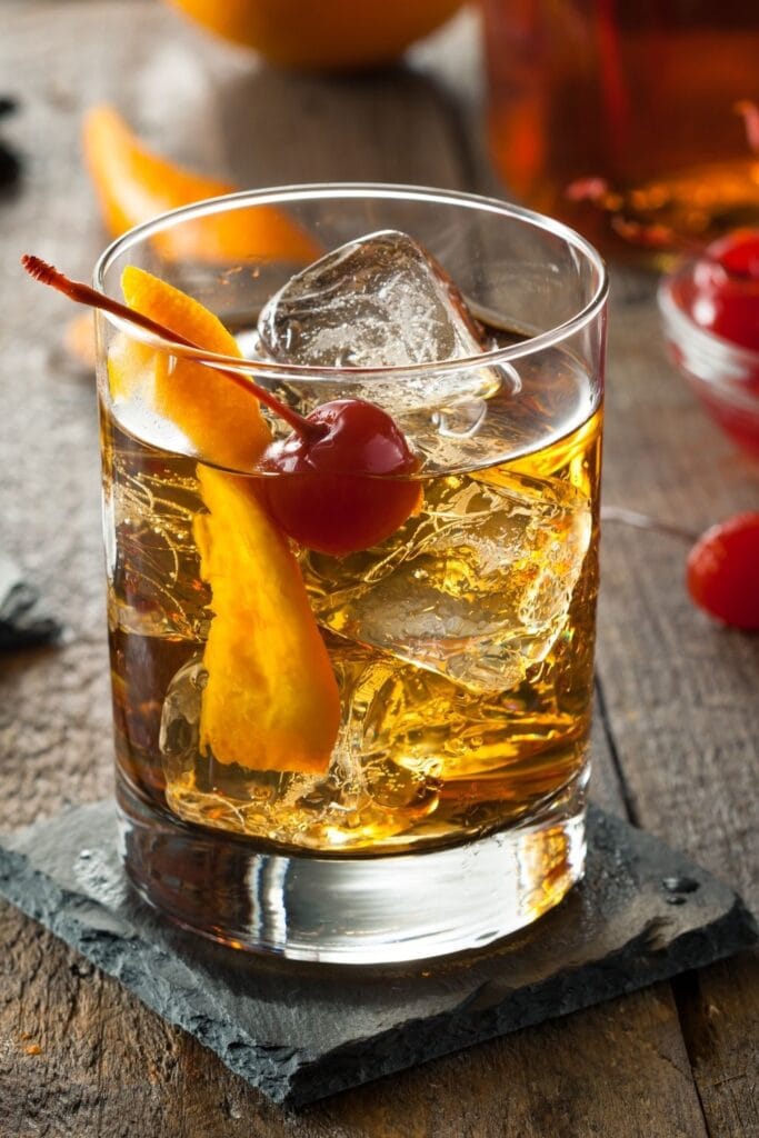 Old-Fashioned Cocktail with Orange and Cherries