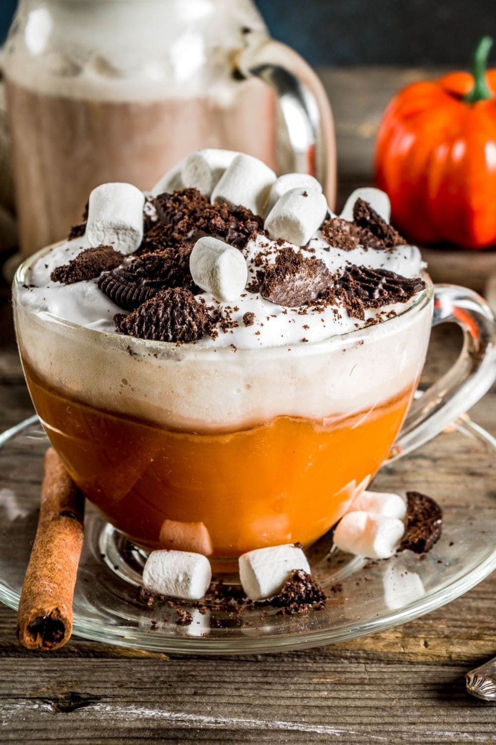 Foamy Spiked Hot Chocolate with  Marshmallows, Crushed Sandwich Cookies, & a Cinnamon Stick