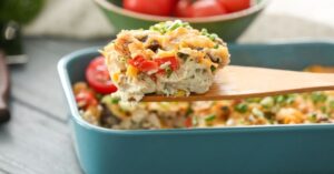Turkey Casserole in a Spatula with Tomatoes and Green Onions