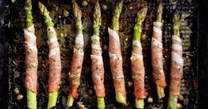 Appetizing Asparagus Wrapped in Bacon with Herbs