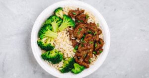 Beef and Broccoli with Rice in a Plate