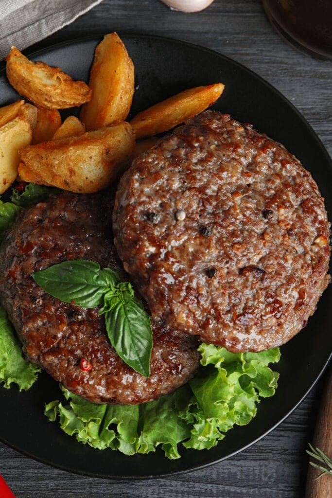 Burger with Lettuce and French Fries
