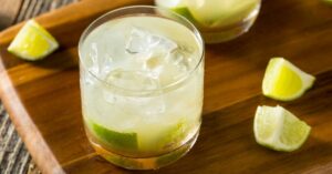 Cold Caipirinha Cocktail with Ice and Lime