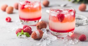 Cold Lychee Cocktails with Raspberries and Ice