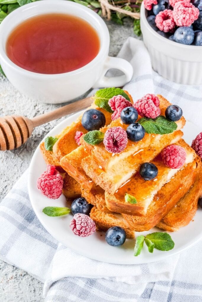 French Toast Bread Sticks with Blueberries and Strawberries