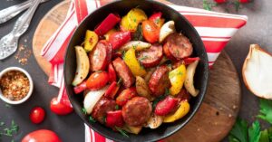 Fried Sausage with Bell Peppers, Tomatoes and Onions