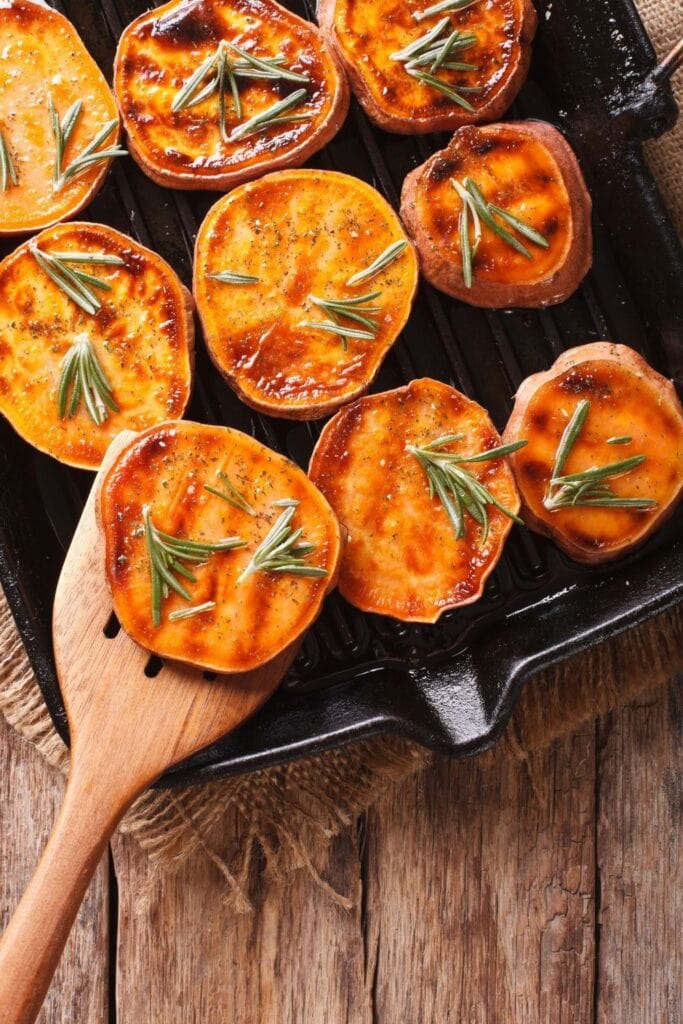 Thanksgiving sweet potato recipes that go beyond pie. Photo shows Grilled Sweet Potatoes with Rosemary