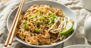 Homemade Chicken Pad Thai with Rice Noodles, Bean Sprouts and Peanuts