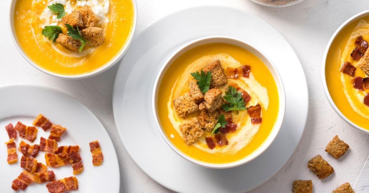 Homemade Creamy Butternut Squash Soup with Croutons and Bacon Bits