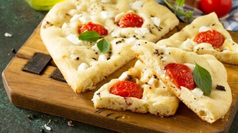 Homemade Italian Focaccia Bread with Rosemary, Tomatoes and Feta Cheese
