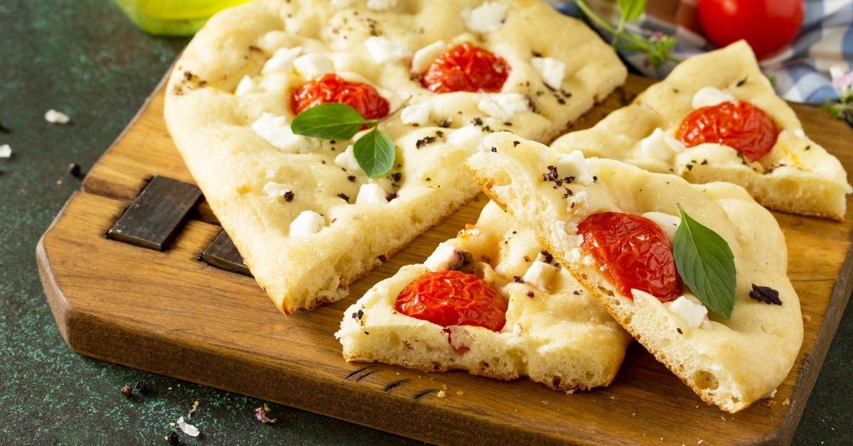 Homemade Italian Focaccia Bread with Rosemary, Tomatoes and Feta Cheese
