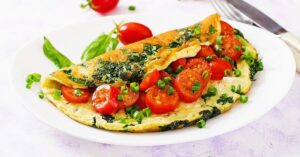 Homemade Omelette with Tomatoes, Spinach and Green Tomatoes