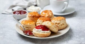 Homemade Scones with Strawberry Jam in a Plate