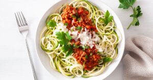 Homemade Zoodles with Meat Sauce and Parmesan