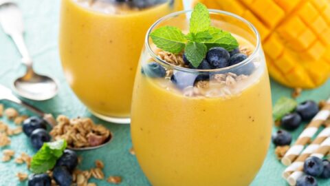 Mango Smoothie with Fresh Blueberries in a Glass