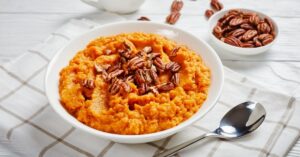 Mashed Sweet Potatoes with Pecan Nuts in a Bowl