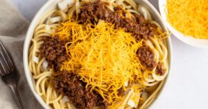 Spicy Homemade Skyline Chili with Pasta, Ground Beef and Cheese