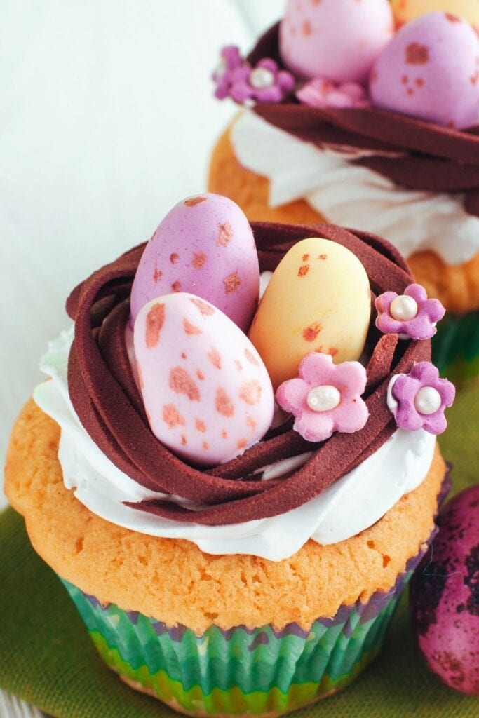 Sweet Muffins with Egg Decorated Candies