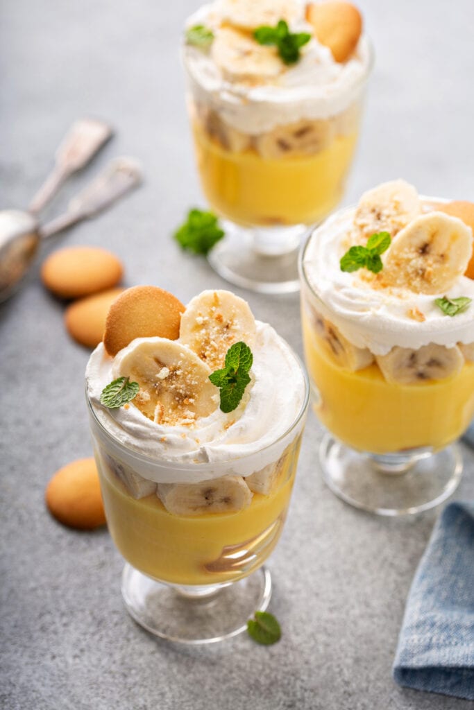 Banana Pudding Layered Dessert with Vanilla Wafers in a Small Glass