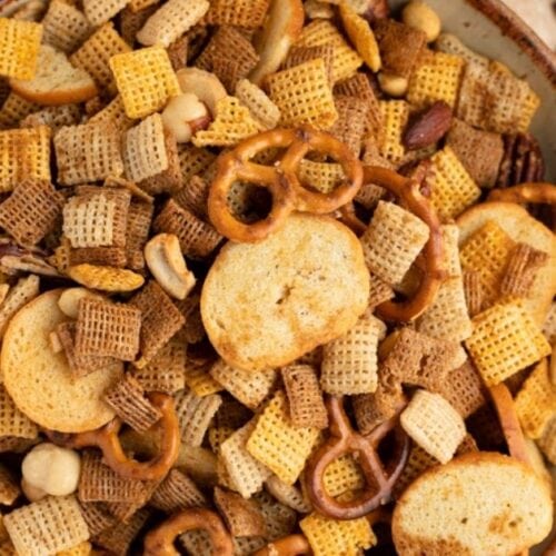 https://insanelygoodrecipes.com/wp-content/uploads/2021/12/Bowl-of-Homemade-Chex-Mix-with-Nuts-Pretzels-and-Crackers-500x500.jpg