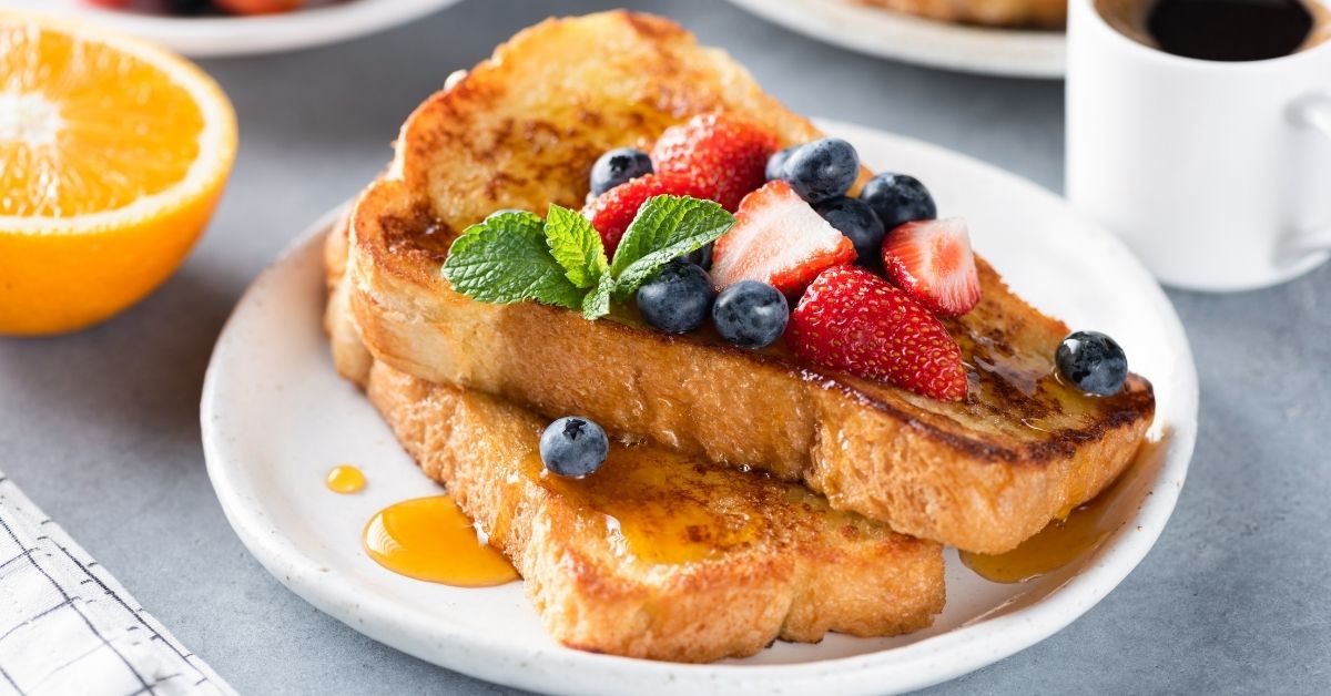 Breakfast French Toast with Berries and a Cup of Coffee