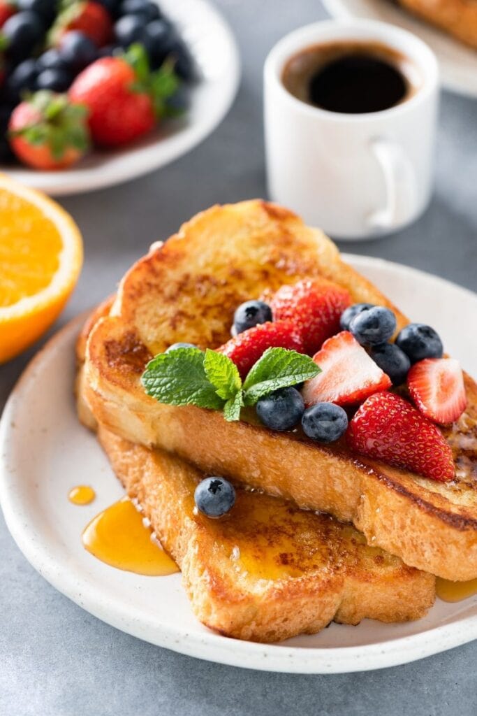 French Toast For Breakfast with Berries and a Cup of Coffee