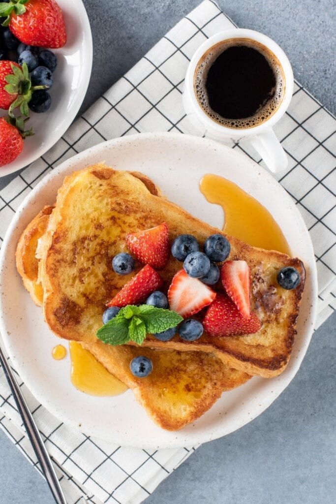 French Toast with Berries and a Cup of Coffee