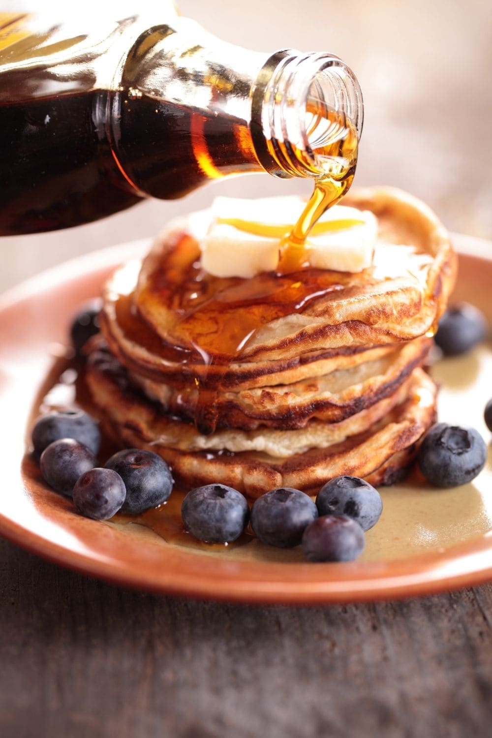 Homemade Pancakes with Bananas, Blueberries and Maple Syrup