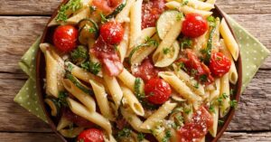 Homemade Penne Pasta with Tomatoes, Prosciutto and Herbs