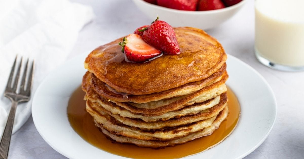 Homemade Soft and Fluffy Pancakes with Fresh Strawberries