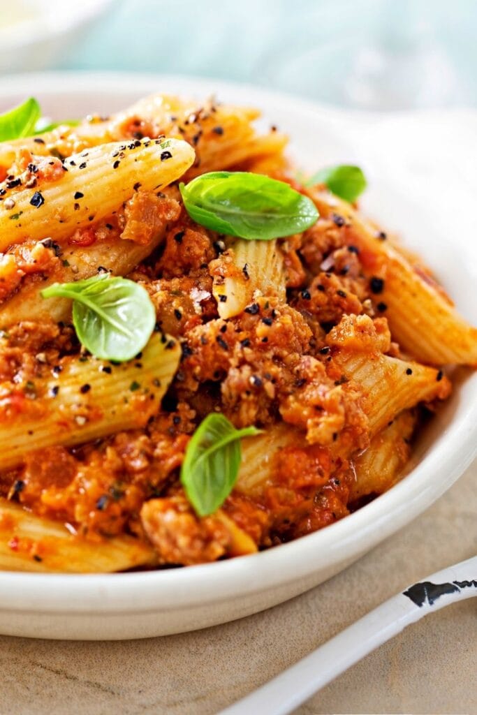 Penne Pasta with Italian Minced Sausage, Tomato Sauce and Basil