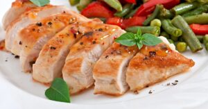 Sliced Chicken Breasts with Vegetables and Sauce