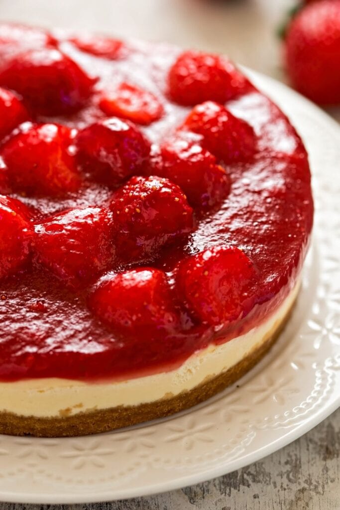 Smooth and Creamy Cheesecake with Strawberry Filling