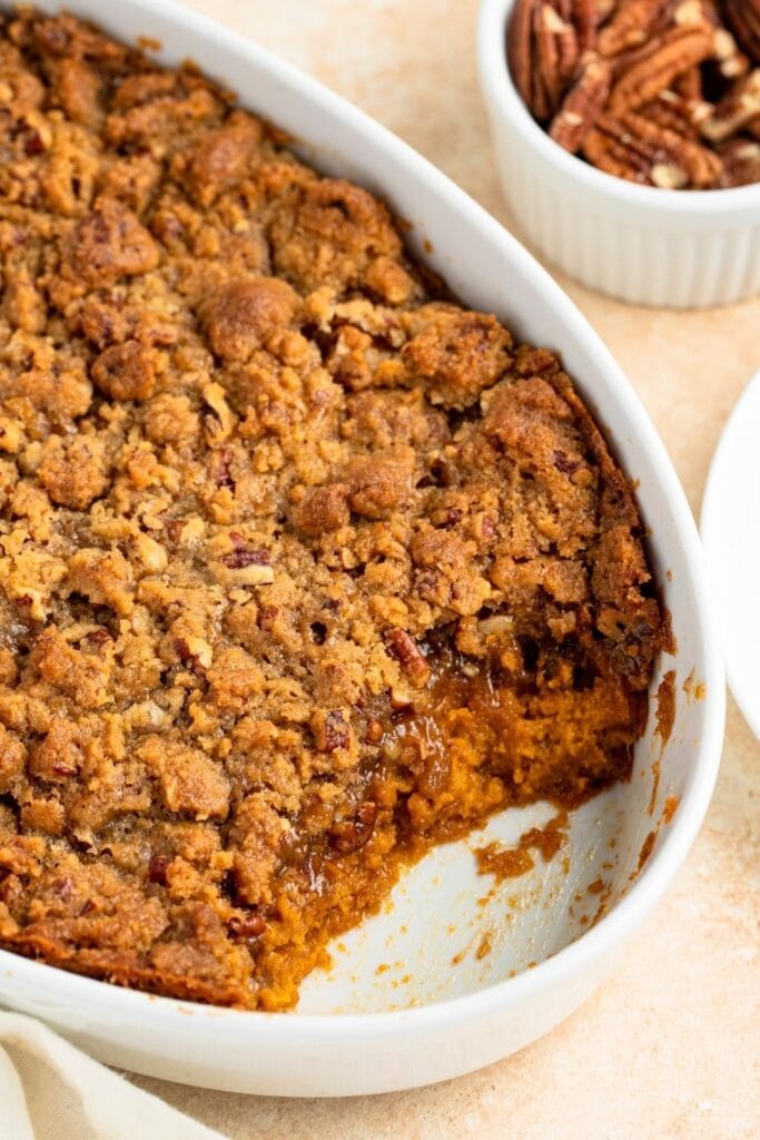 Tender and Crunchy Sweet Potato Casserole Topped with Pecans