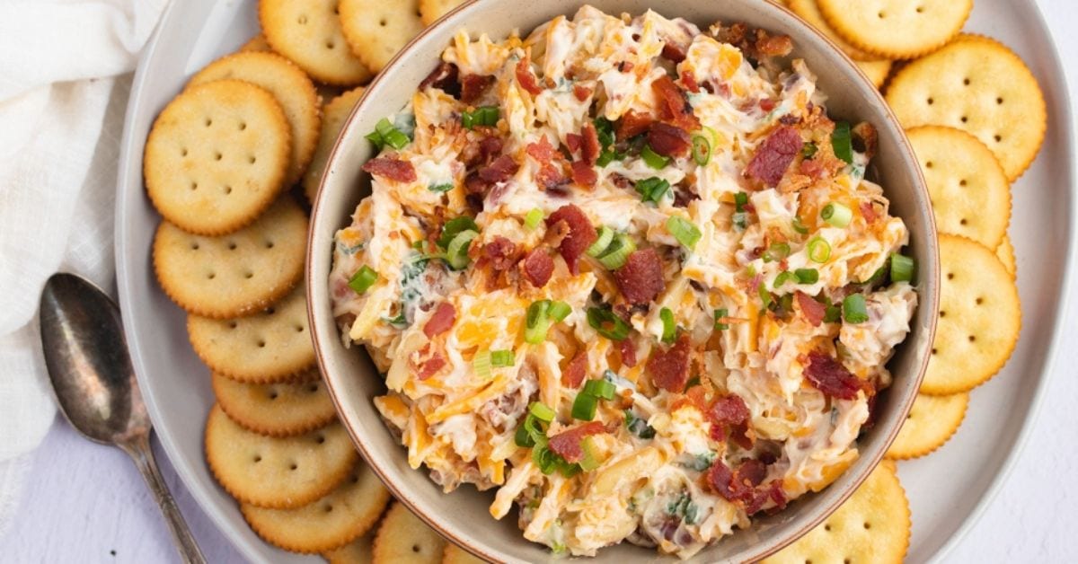 Appetizing Homemade Million Dollar Dip with Bacon, Onions, Cheese and Biscuits