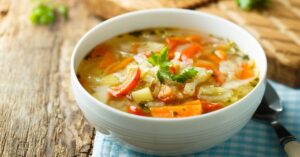 Bowl of Cabbage Soup with Tomatoes
