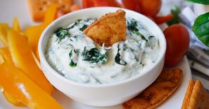 Bowl of Homemade Spinach Dip with Crackers