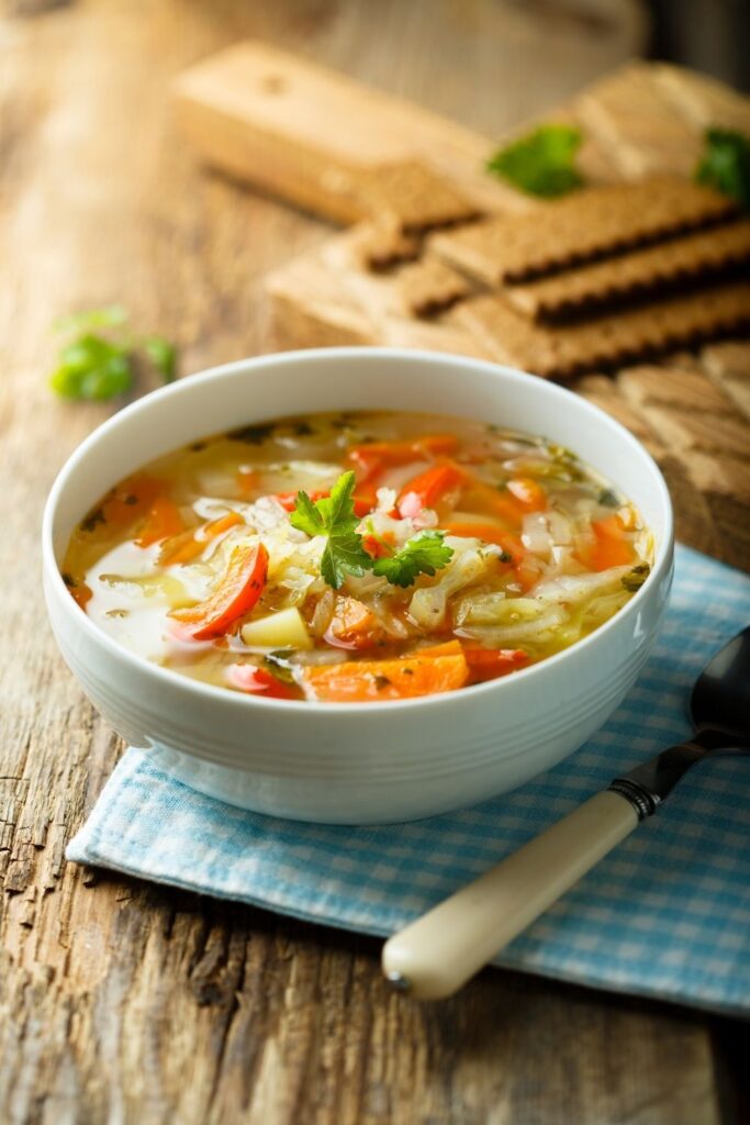 Cabbage Soup in a Bowl with Tomatoes