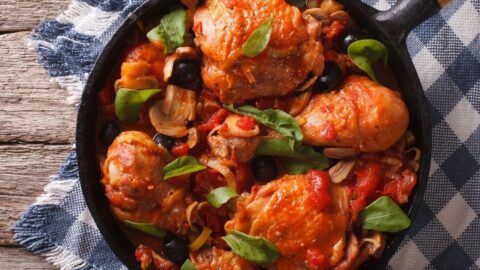 Cacciatori Chicken with Mushrooms and Olives in a Cast Iron Pan
