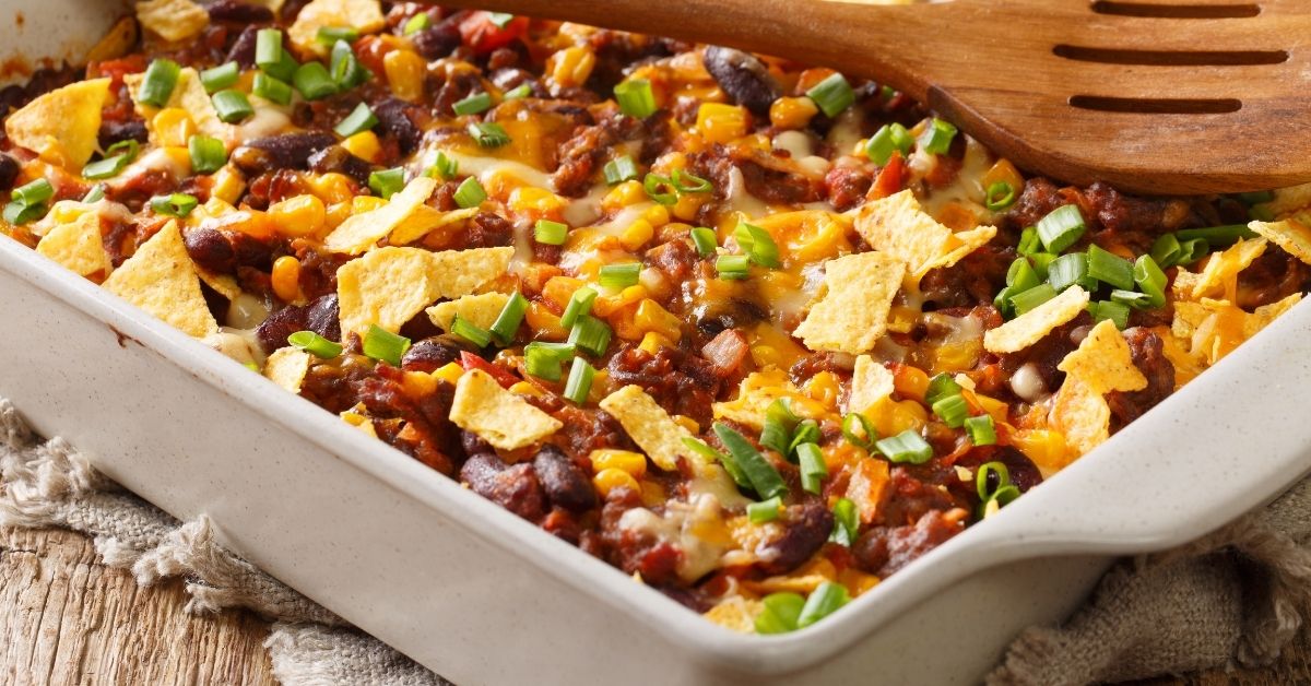 Cheesy Frito Ground Beef Casserole with Beans, Corn and Green Onions