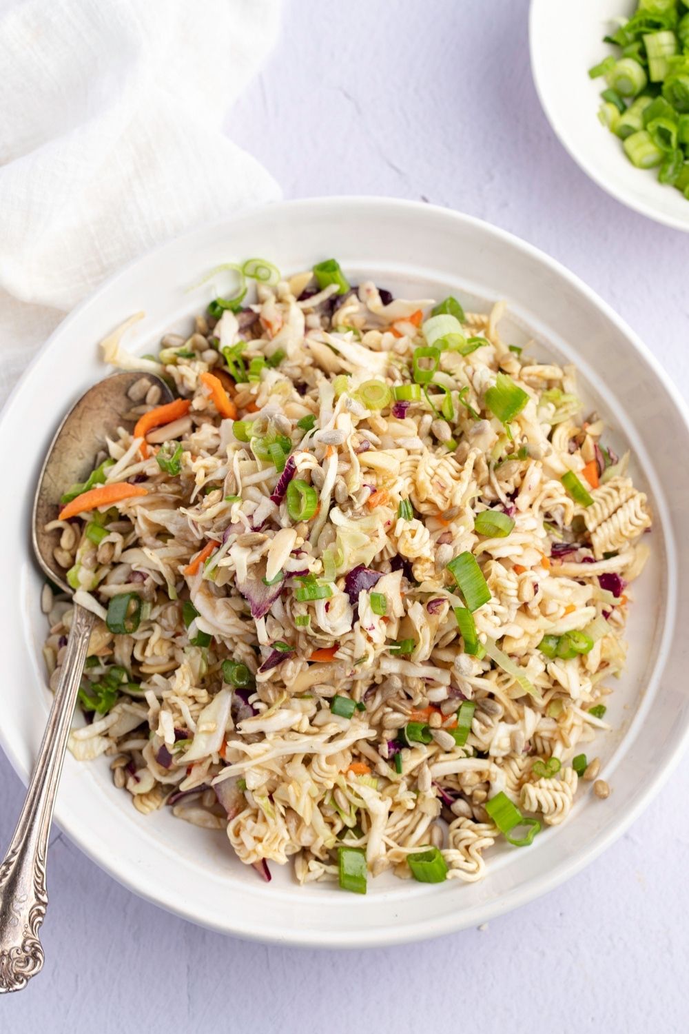 Best Oriental Coleslaw (Easy Asian Recipe) featuring Colorful and Crunchy Oriental Coleslaw with Carrots, Cabbage, Green Onions, and Ramen Noodles