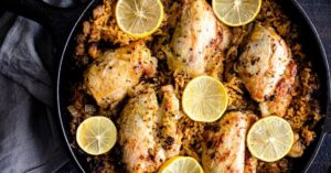 Homemade Baked Chicken Thighs with Lemons and Rice