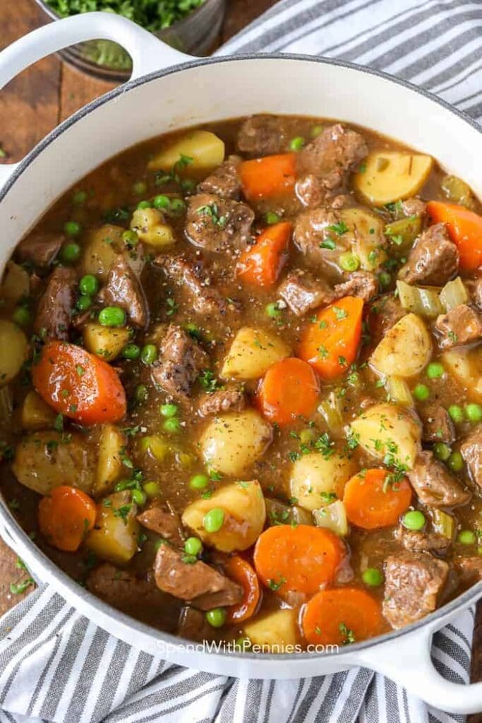 This cozy beef stew is made on the stovetop with tender beef, hearty potatoes, onions, celery, peas, and carrots. It's the ultimate cold weather comfort food. 