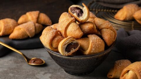 Sweet Homemade Crescent Rolls Filled with Chocolate Syrup