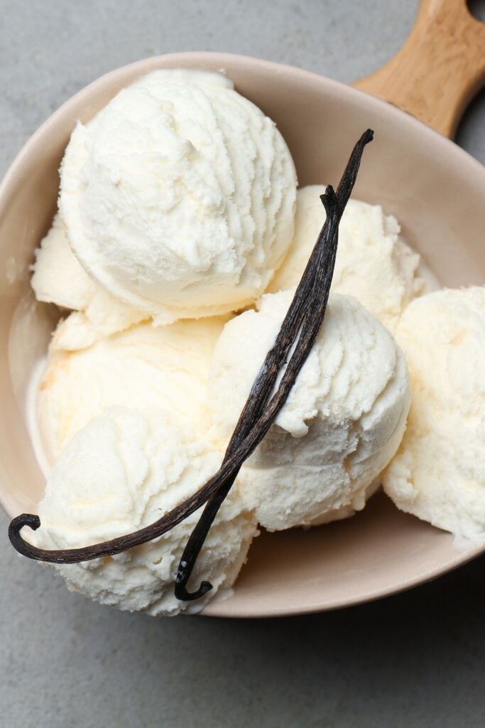 Best Ninja Creami Recipes featuring sweet vanilla bean ice cream in a bowl with vanilla pod on top