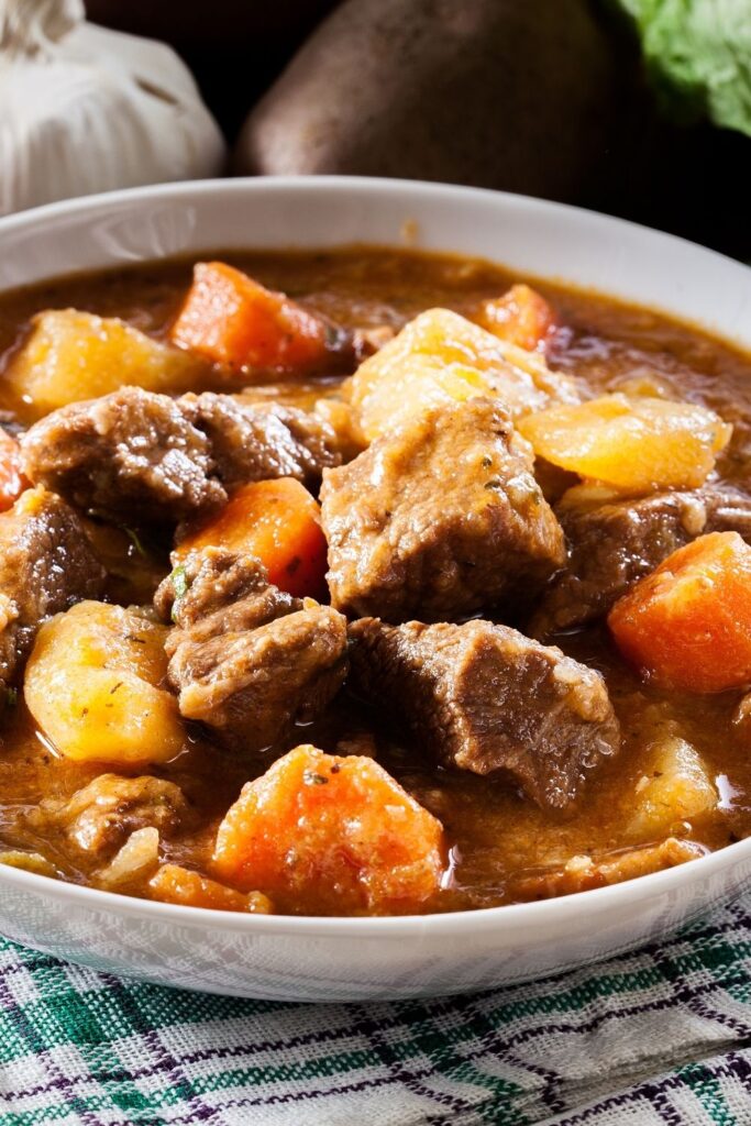 30 Easy Stew Recipes for a Cozy Winter Dinner featuring Beef Stew with Carrots and Potatoes served in a bowl