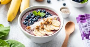 Bowl of Acai Smoothie Bowl with Blueberries and Bananas
