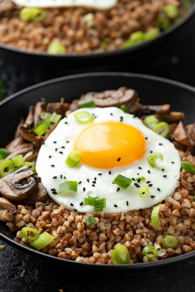 Bowl of Buckwheat with Eggs, Mushrooms and Onions