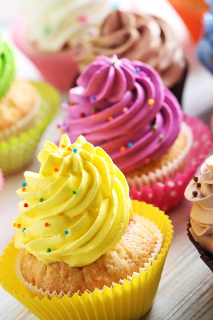 Cupcakes with Sprinkles and Different Colorful Frostings